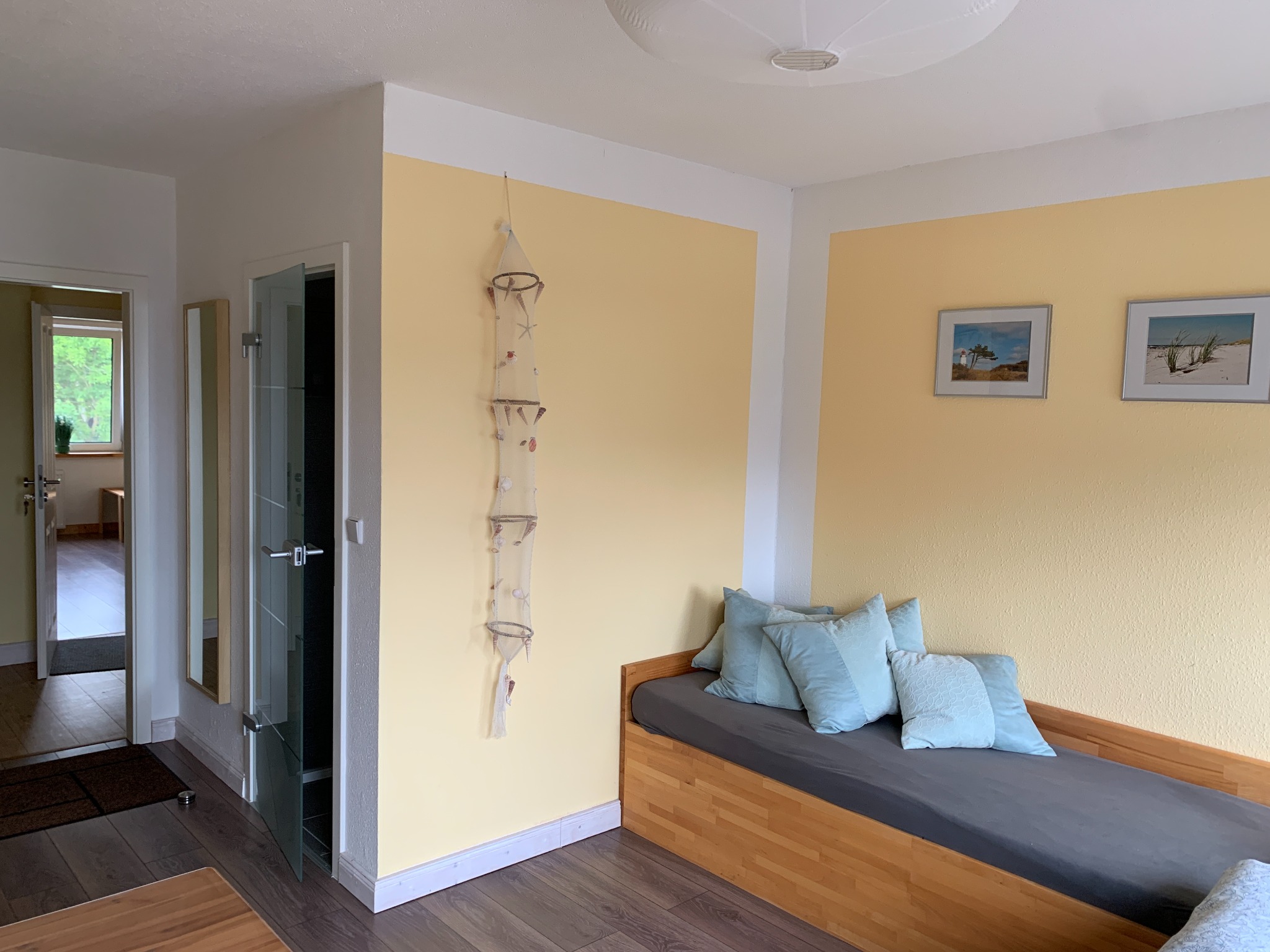 Twin room with seating and sleeping area