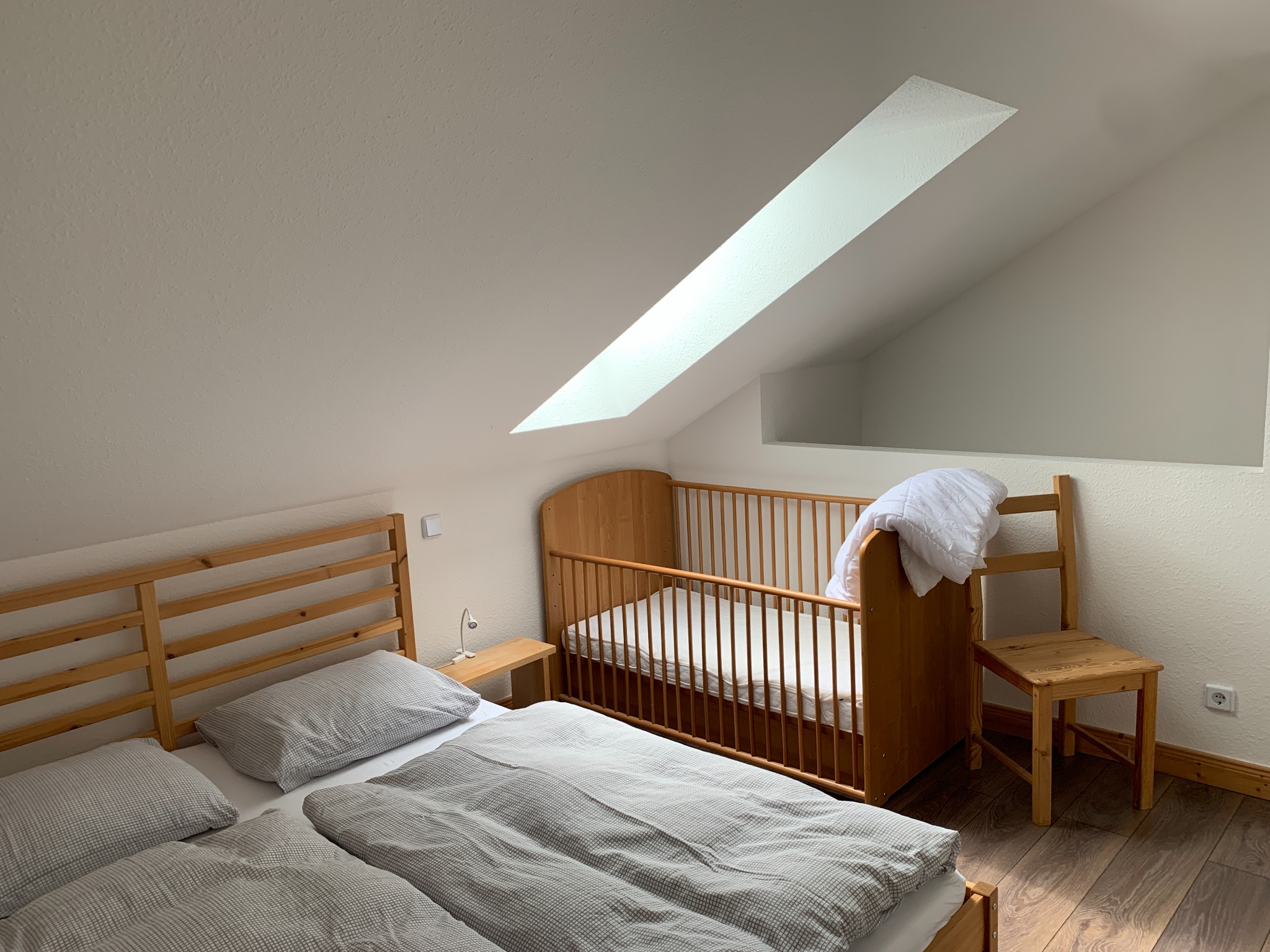 Family room with double bed and child bed