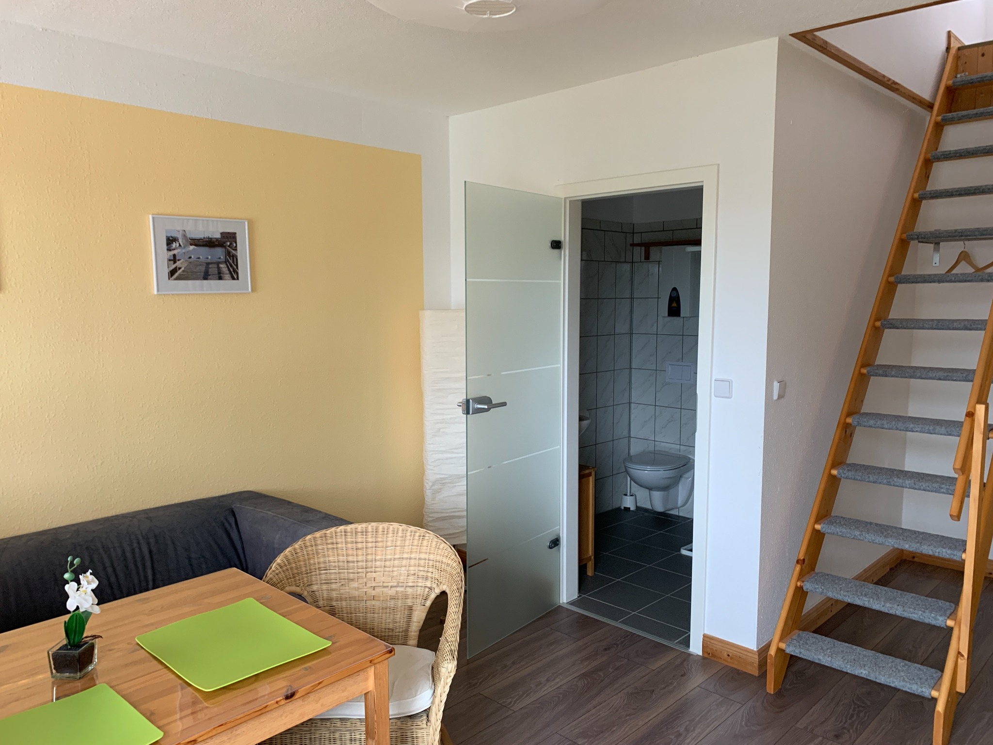 Seating area and bathroom access in the family room