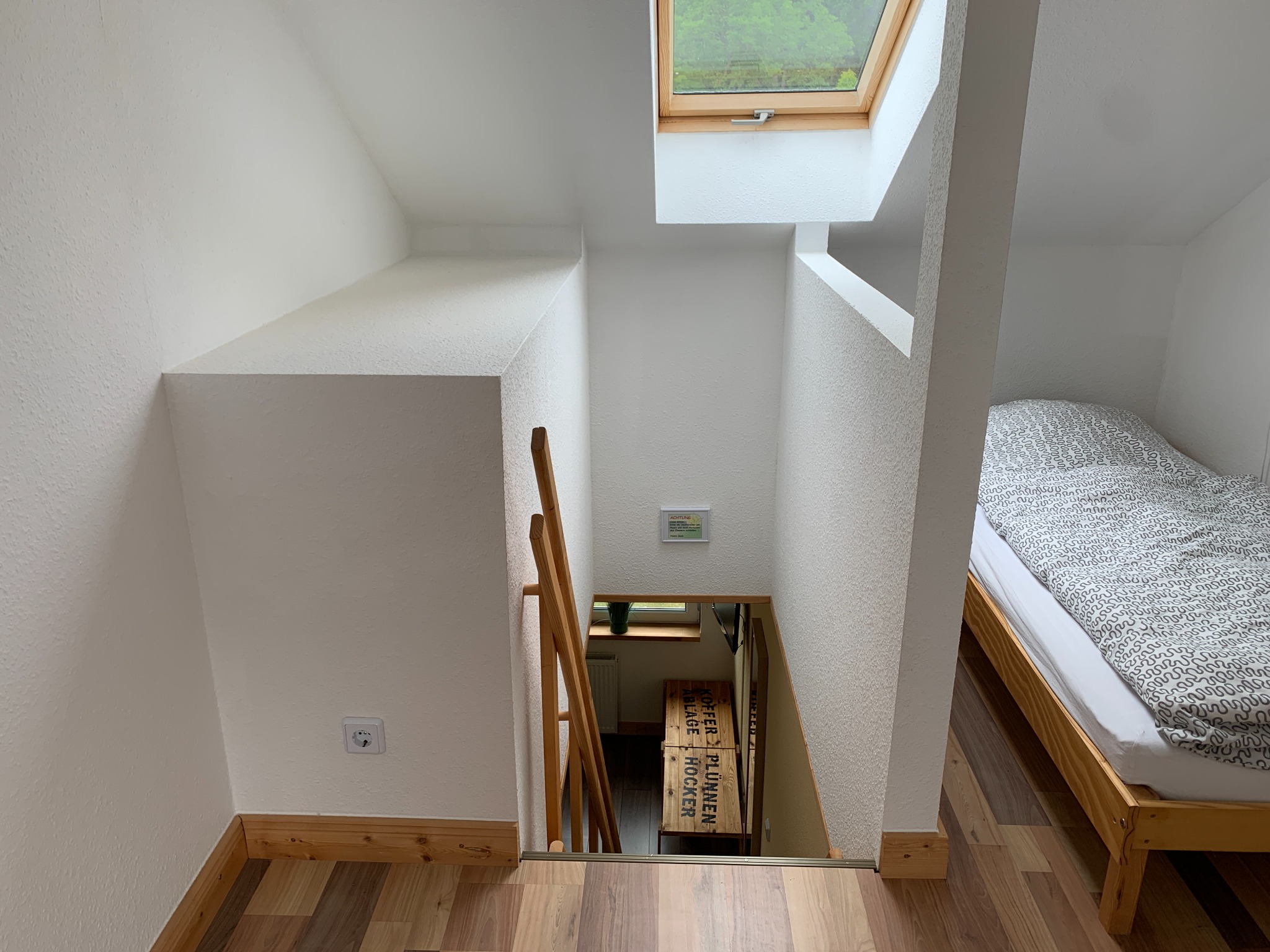 Stair landing between the sleeping spaces